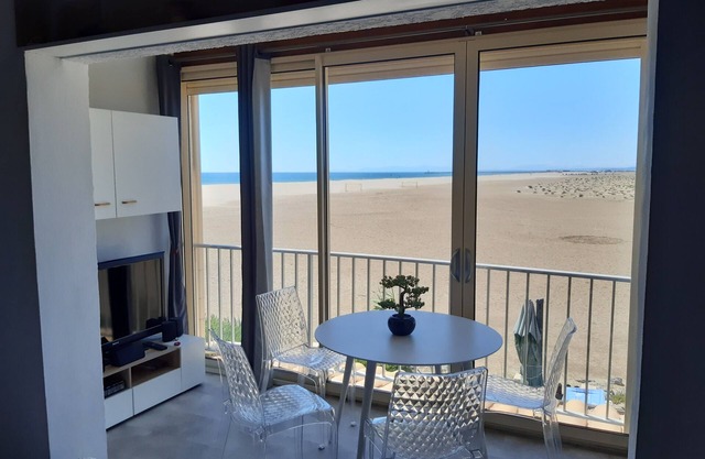 Duplex apartment on the beach with sea and mountain views