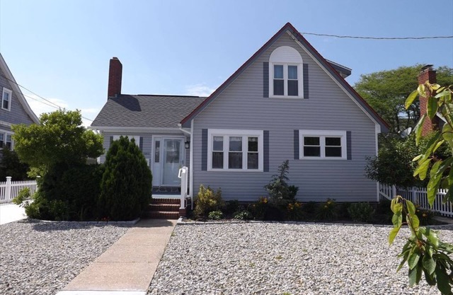 Enjoy a classic seashore vacation in this perfectly situated, rustic 4 BR, expanded cottage