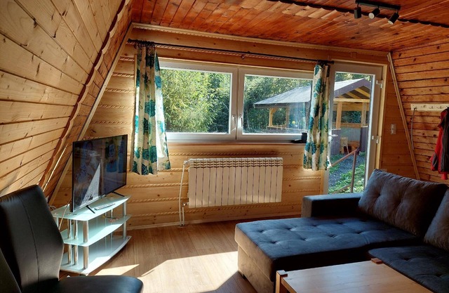 Enjoy a nature hut with terrace and fireplace at a reasonable price