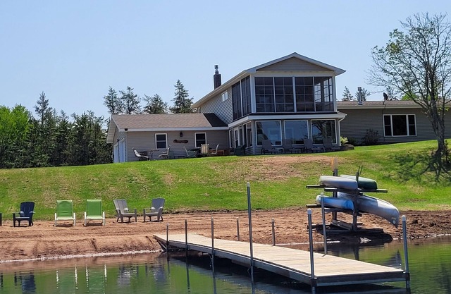 Exclusive Retreat! Private Lake, River Frontage and 100's of Acres with Trails