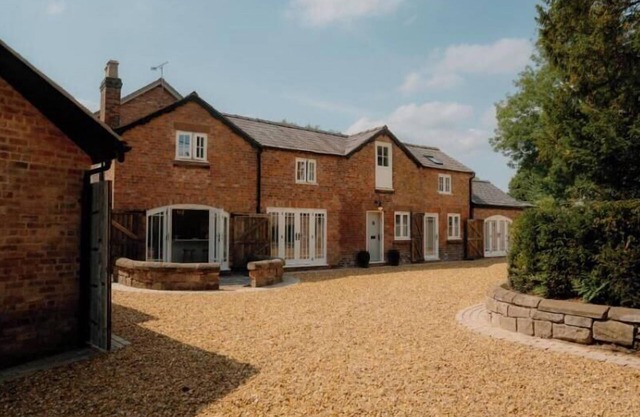 Historic building offers an inviting retreat with its charming blend of comfort and elegance.