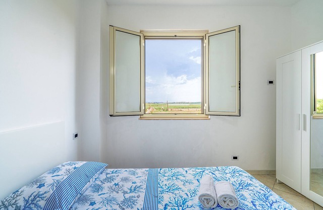 Holiday Apartment "La Nassa" with Sea View, Private Terrace & Shared Garden