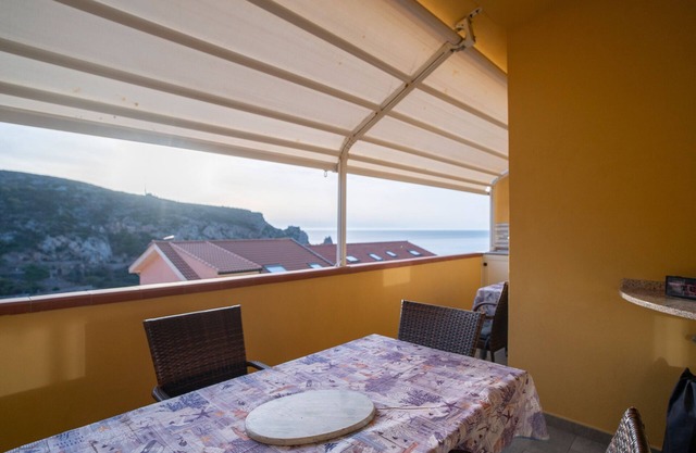 Holiday Home 'Sole E Mare Buggerru - Appartamento' with Sea View, Private Terrace and Air Conditioning