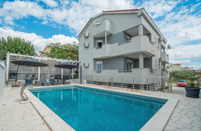 Holiday home Viktoria with large swimming pool and partial seaview