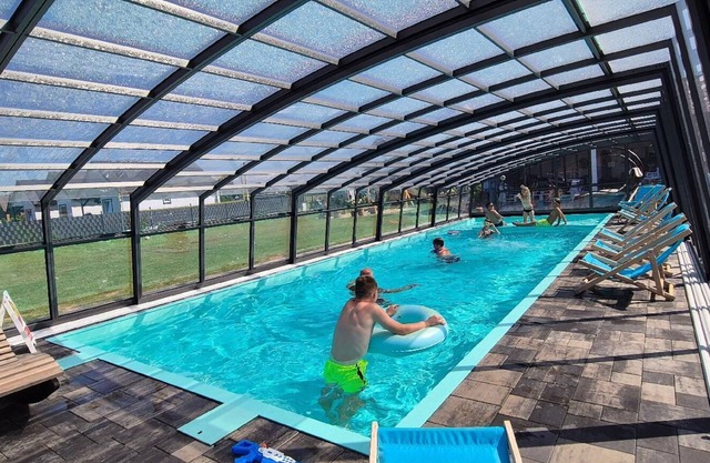 Holiday home with communal pool