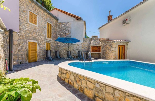 Holiday home with pool, sun terrace and barbecue