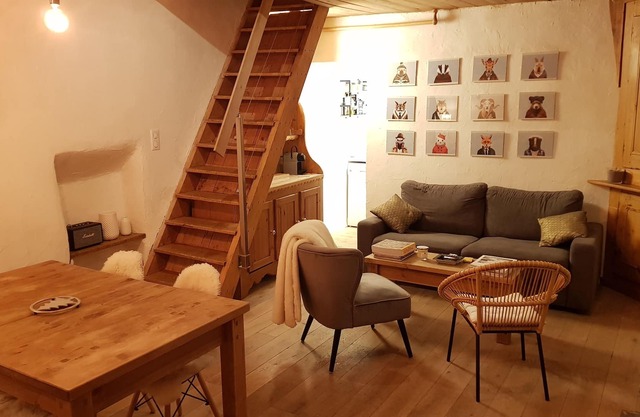 In the heart of the village of Praz de Courchevel at the foot of the slopes