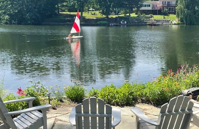 Lake Front Cottage with Sun Soaked Terraces