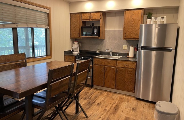 Lakefront 2BR Duplex Cabin w/Pool + Boat dock