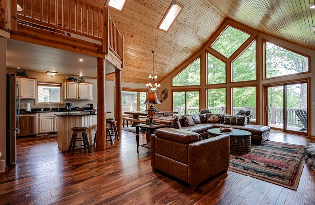 Lakefront home with private dock, beach, firepit, playground, deck & game room