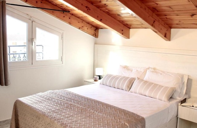 Lightful Attic at Regina Apartments