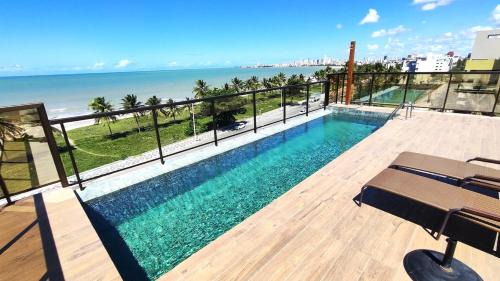 Lindo apto com vista p o mar dos 2 quartos, ar con