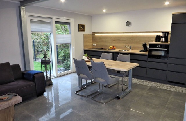 Look forward to relaxing on approx. 54 square meters of living space in the Berumbur vacation park near the North Sea coast. Our facilities: fenced property (ideal for dog owners), parking space, garage for bicycles/e-bikes, underfloor heating.