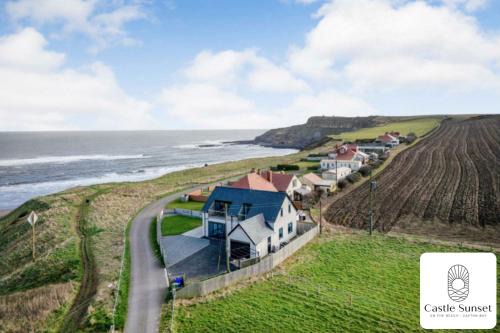 Luxury 4-Bedroom Beachfront Home with Hot Tub & Games Room