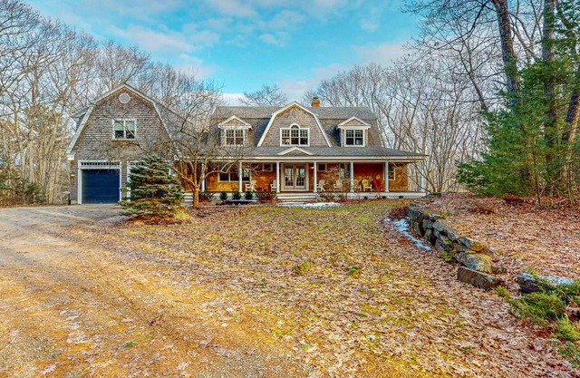 Maine-by-the-Sea home on five acres with a guest suite, water views, & grill