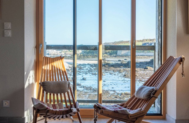 Mill on the beach, sea view