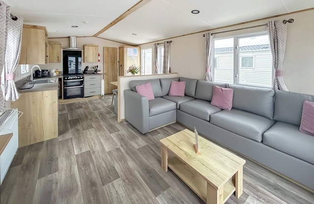 Modern and contemporary 12ft wide caravan with one double and one twin.