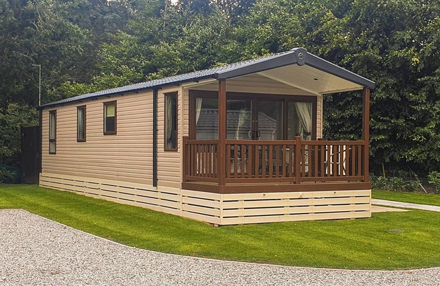 Modern holiday home with one double bedroom and two twin bedrooms.