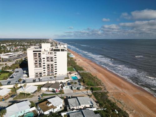 New Listing! Fully renovated with a sunset view, beachfront property with a heated pool