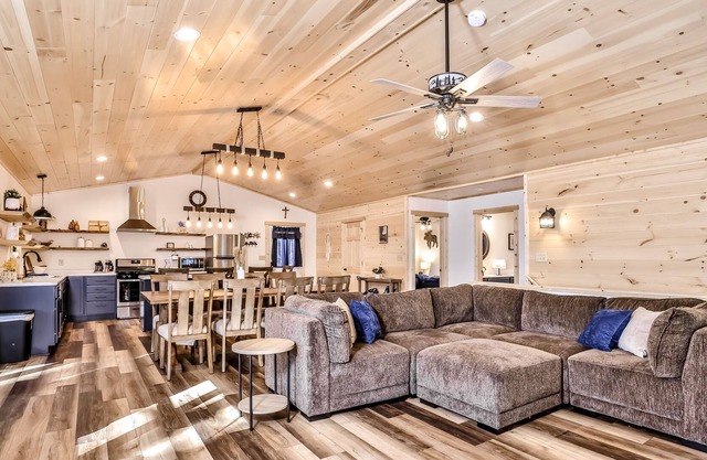 Newly built wilderness retreat with a balcony, grill, firepit, game room, and AC