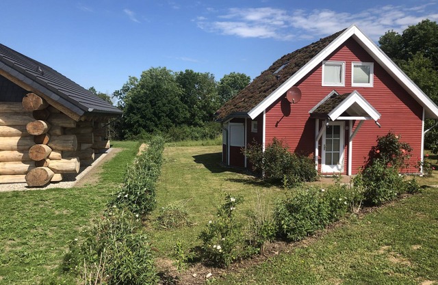 Norwegian lake house next to nature reserve