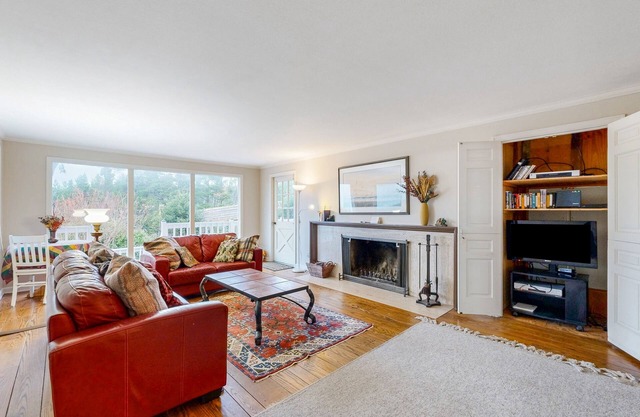 Oceanfront charmer with wood fireplace, games, & scenic deck - dog-friendly