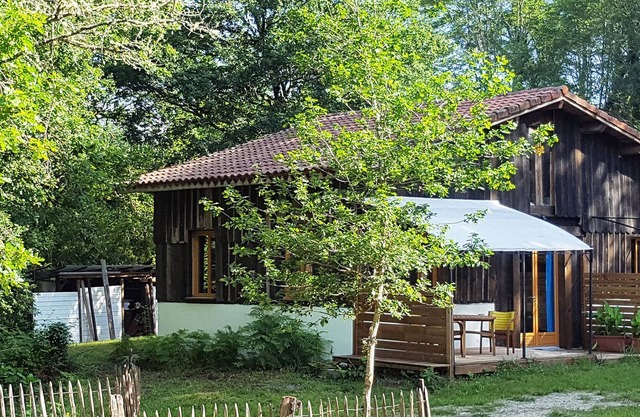 pretty charming outbuilding on the edge of a private lake