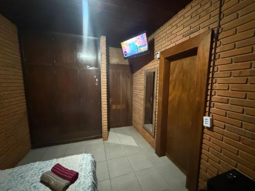 Quarto com banheiro privativo no Centro