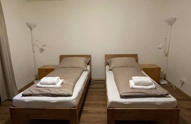 Room 1 - twin room, shower/toilet on the floor - Haus St. Martin