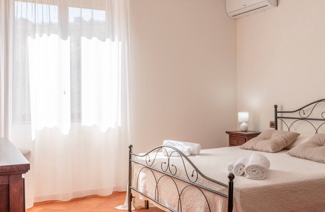 Room 'Monte Suso' with sea view, shared terrace and air conditioning
