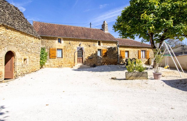Rustic stone house with garden and fireplace near Sarlat