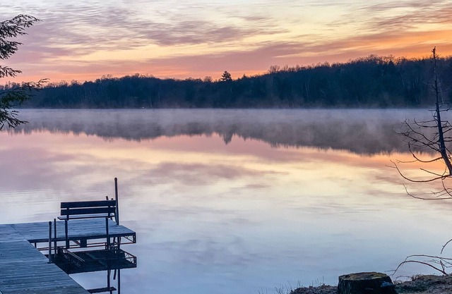 Rustic Lakeside Home with Dock, Firepit, Lake Views, and Screened-In Porch