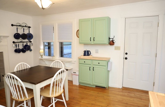 Serenity abounds in this beautiful 93-year-old farmhouse with mountain views.