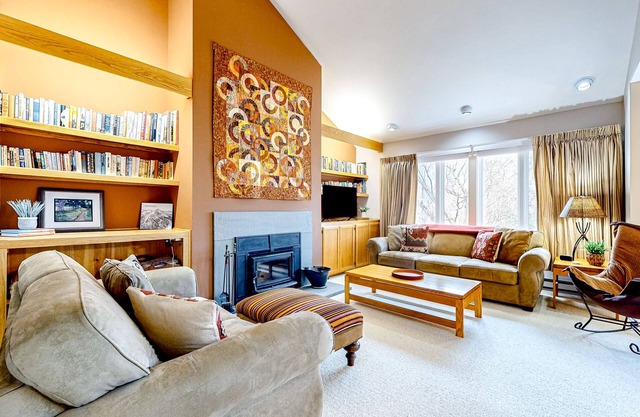 Ski-in/out condo steps from the lifts/village with fireplace & mountain views