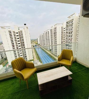 Skyline 1bhk Central Park Flower valley The Room