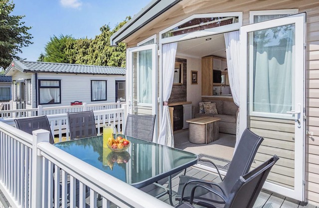 Spacious and luxurious 12ft-wide caravan with one double and two twin bedrooms.