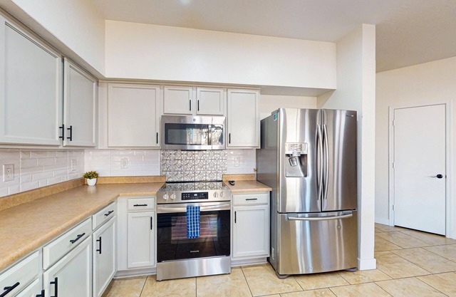 Spectacular home with private pool & pool chiller, grill, loft w/games