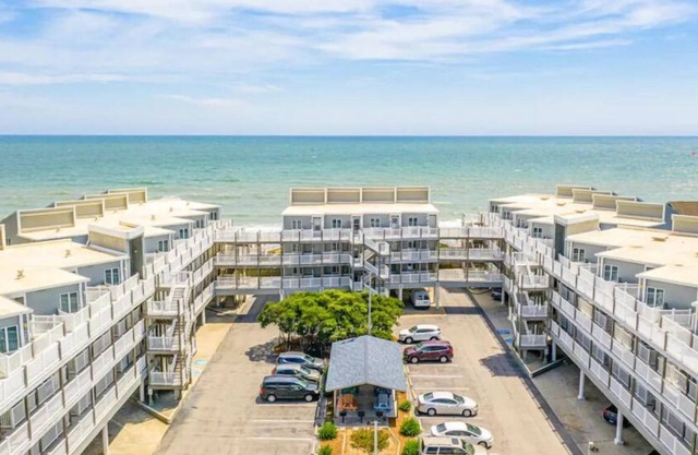 Spectacular partial ocean view 2BR 2BA large top floor condo-beachfront complex!