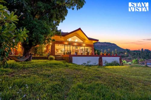 StayVista at Three Shores with Lake View & Alfresco Dining