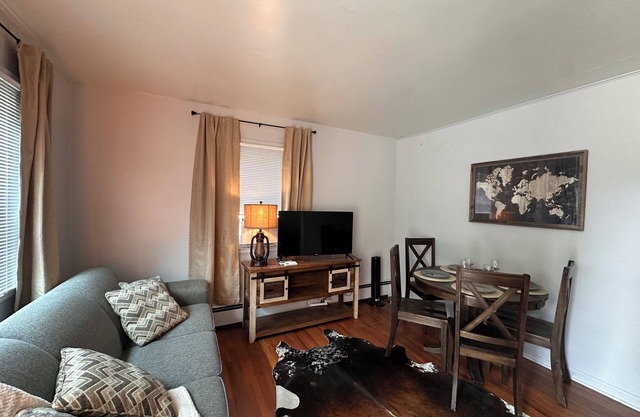 "Steps from downtown and the park, this cozy mid-century hideaway offers comfort, charm, and a private outdoor escape."