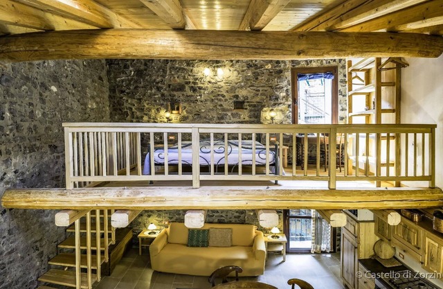 Studio apartment with mezzanine in a historic building in Zorzino