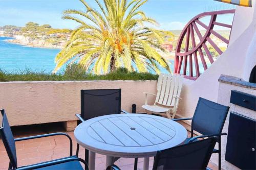 Terrasse avec superbe vue mer & pieds dans l’eau