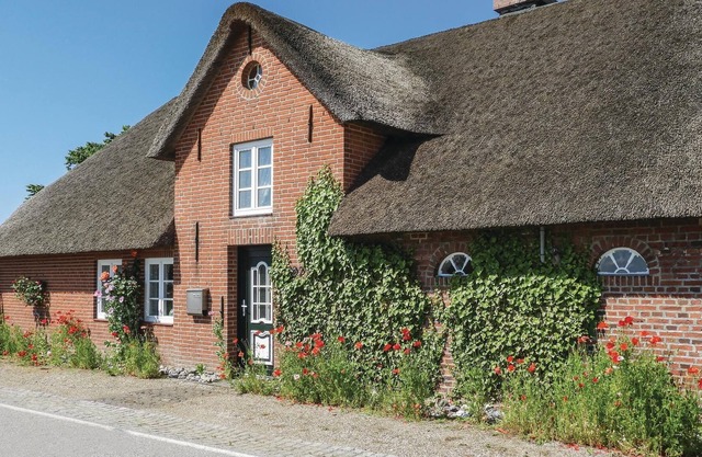 This quaint thatched house was made into a cozy vacation home for 4 people without losing the typica