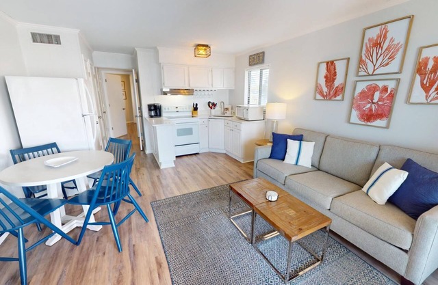 Top floor condo w. partial ocean + community pool views.