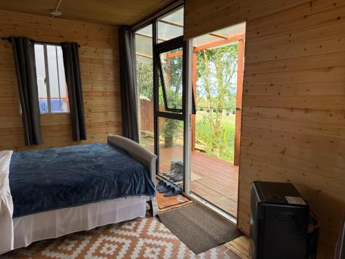 Valley view cabin in the woods on a farm