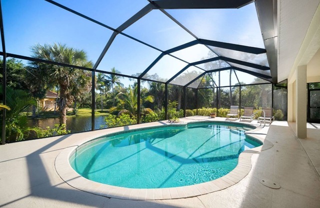Vibrant home close to best beach parks and shops backyard pool with a lake