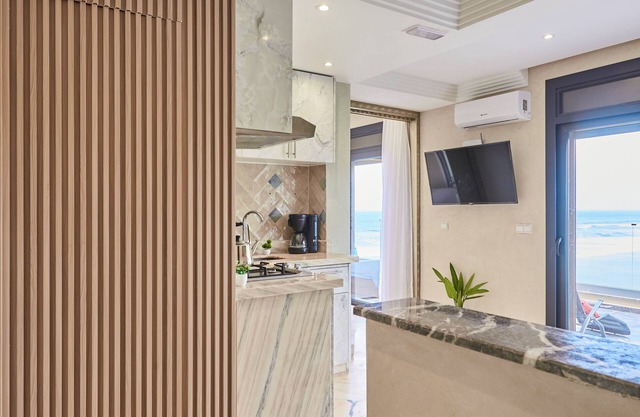 Wake to Waves: Stylish 1-Bedroom by the Shore