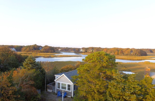 Waterfront! Riverfront delight. 2 BR, private, decks. Steps to Craigville Beach