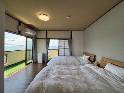 Kamiamakusa Apartment | お宿UmiSora