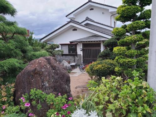 Tomi House | ゲストハウス陽だまりの宿